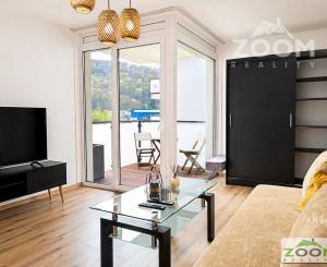 PRENÁJOM - 2 izbový byt s loggiou, podlahovým kúrením a park. miestom